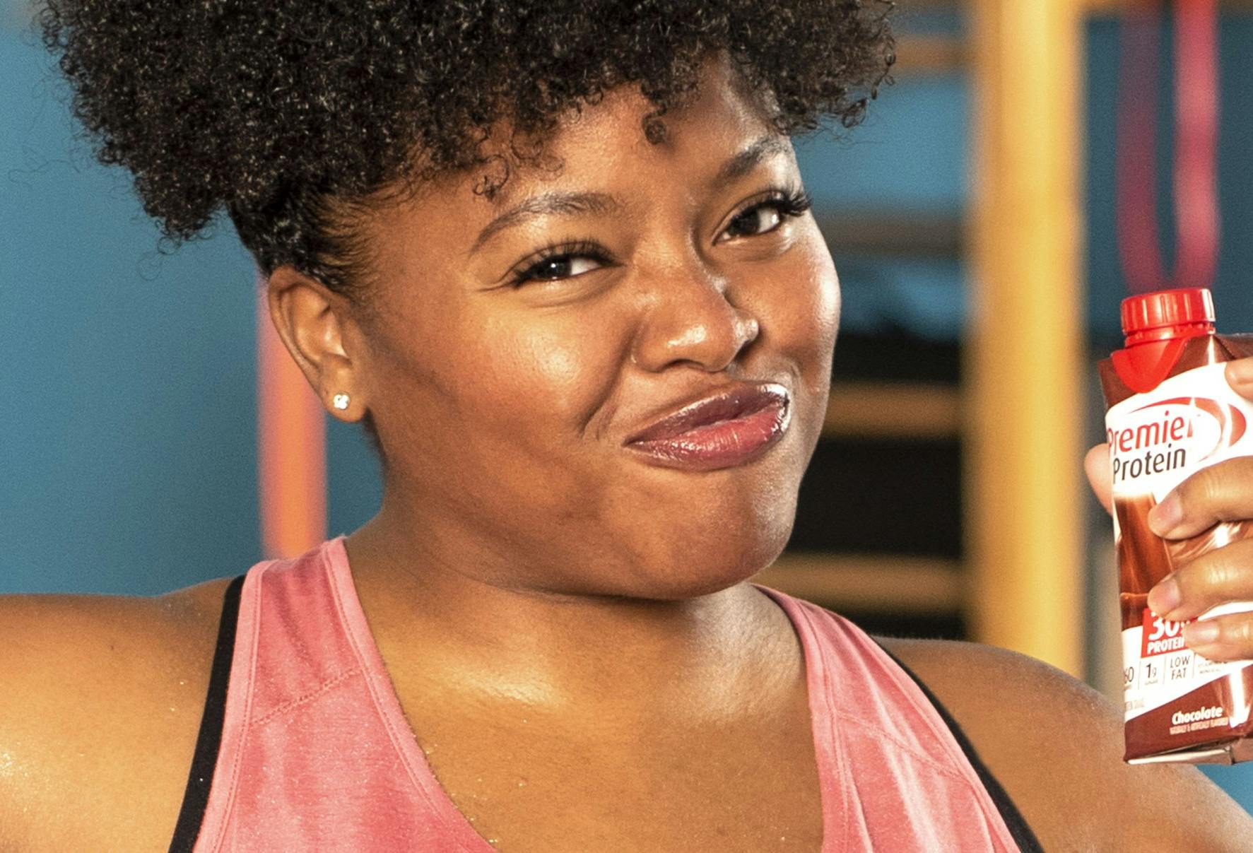 A women flexing her muscles.