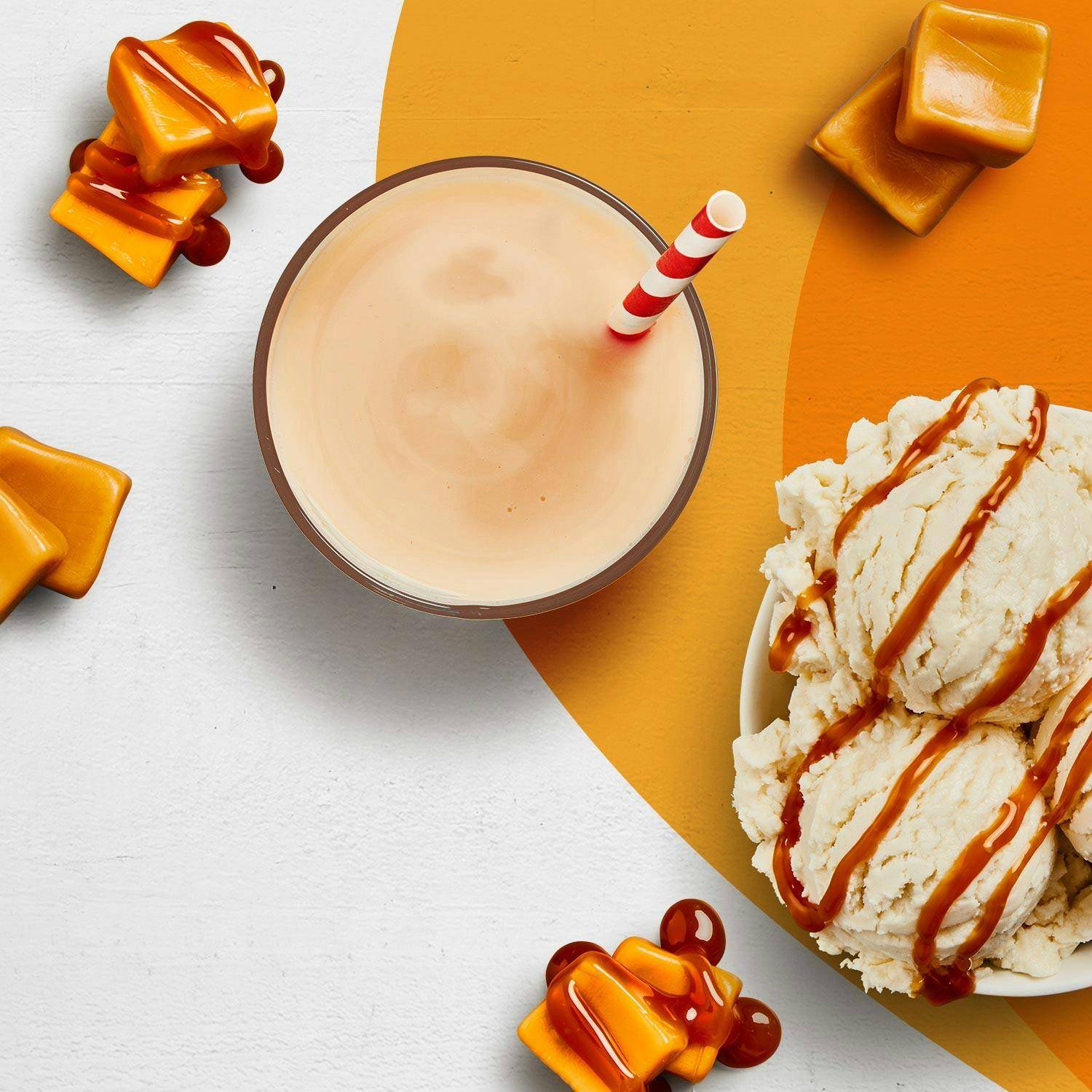 A caramel Premier Protein shake next to pieces of caramel and a bowl of caramel ice cream.
