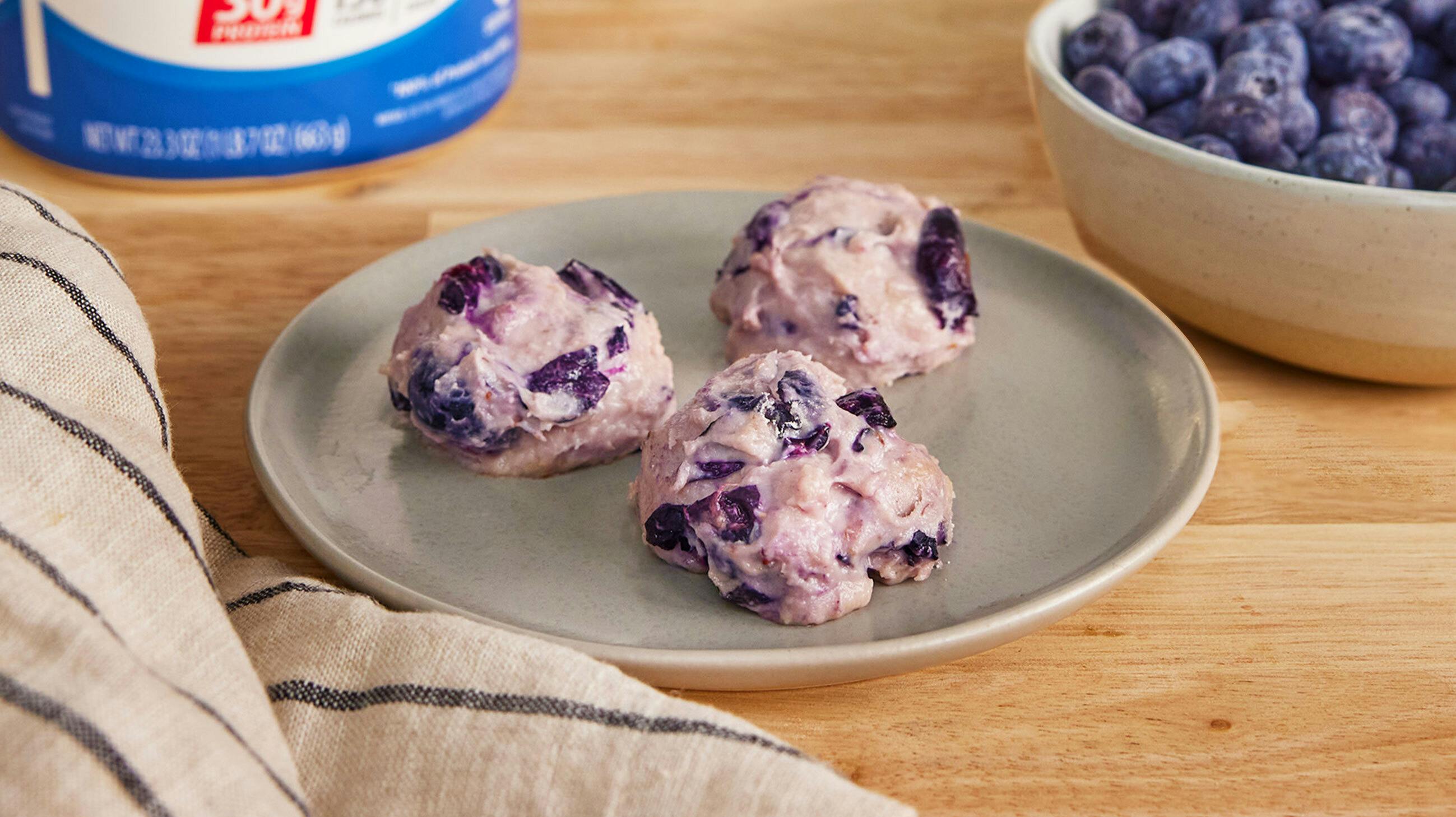 Recipe image for Blueberry Protein Cheesecake Bites.