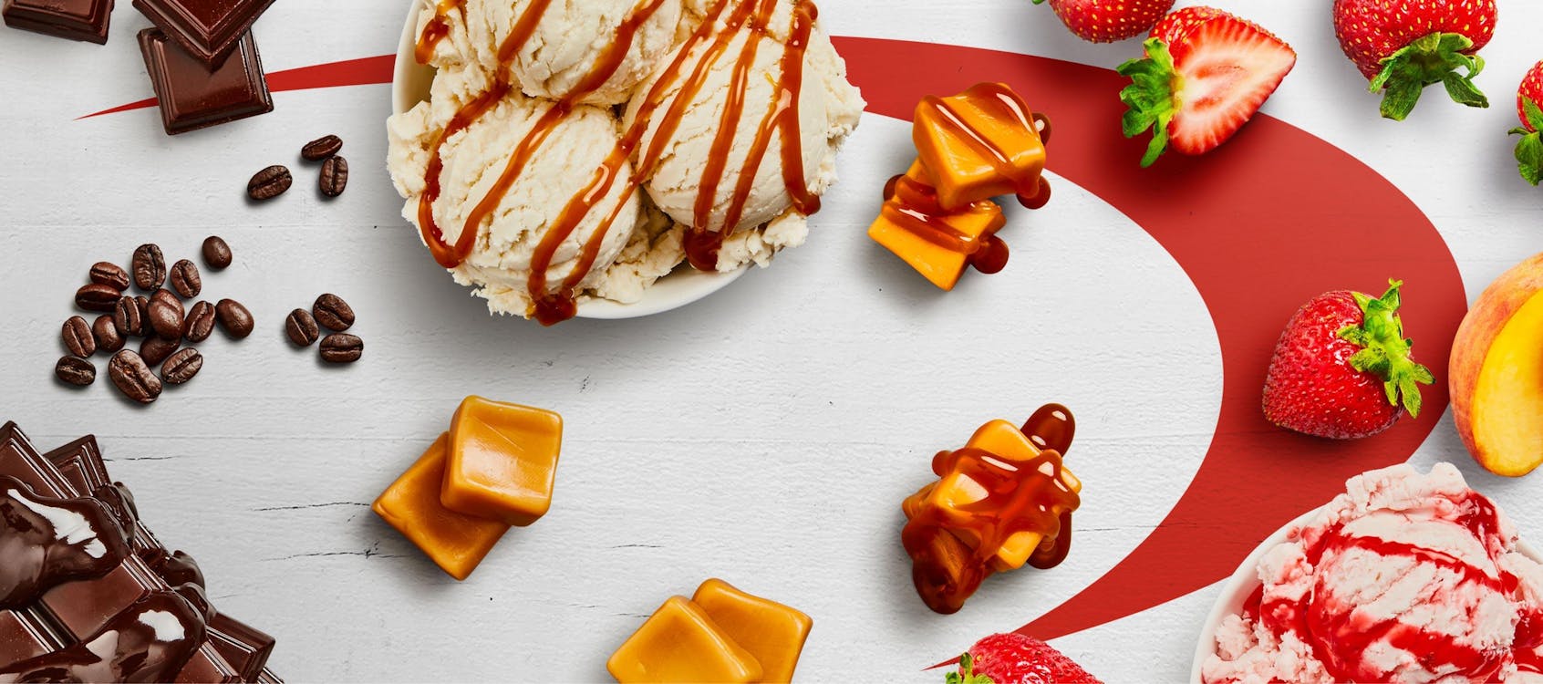 A variety of ice cream, chocolate, caramel and fruit